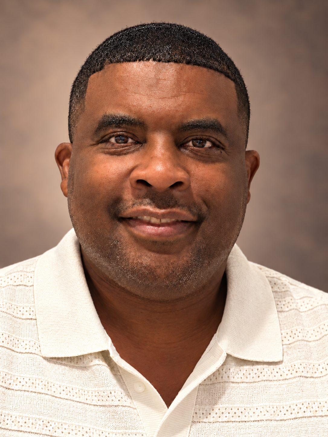 Chad Robinson, founder of Blueprint Brand Management Group, in an ivory collared shirt